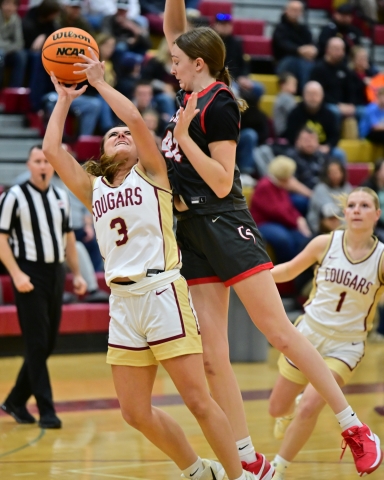 Reese Nolan (3) goes up against a Cave Spring defender.